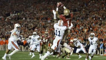 Jan 6, 2014; Pasadena, CA, USA; Florida State Seminoles wide receiver Kelvin Benjamin (1) catches a touchdown pass over Auburn Tigers cornerback Chris Davis (11) during the second half of the 2014 BCS National Championship game at the Rose Bowl. Mandatory Credit: Robert Hanashiro-USA TODAY Sports