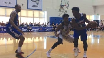 The Detroit Pistons Stanley Johnson sizes up Miami Heat forward Justise Winslow during an NBA Summer League game in Orlando on July 6, 2015.