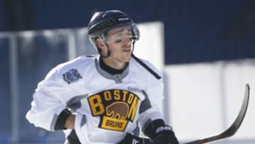 Dec 31, 2015; Foxborough, MA, USA; Boston Bruins left wing Brad Marchand (63) adjusts his jersey during practice the day prior to the Winter Classic hockey game at Gillette Stadium. Mandatory Credit: Greg M. Cooper-USA TODAY Sports