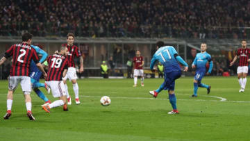 MILAN, ITALY - MARCH 08: Henrikh Mkhitaryan of Arsenal scores during the UEFA Europa League Round of 16 match between AC Milan and Arsenal at the San Siro on March 8, 2018 in Milan, Italy. (Photo by Catherine Ivill/Getty Images)
