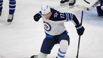 Mar 13, 2021; Toronto, Ontario, CAN; Winnipeg Jets forward Adam Lowry (17) celebrates after scoring against Toronto Maple Leafs in the third period at Scotiabank Arena. Mandatory Credit: Dan Hamilton-USA TODAY Sports