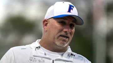Florida's head coach Tim Walton talks to the players before the start of FloridaÕs home season opener against Jacksonville University at Katie Seashole Pressly Stadium in Gainesville, FL on Wednesday, February 15, 2023. Florida beat the Dolphins 11-0. [Cyndi Chambers/ Gainesville Sun] 2023Gator Softball February 15 2023 Gainesville Florida