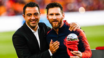 Xavi Hernandez and 10 Leo Messi from Argentina of FC Barcelona during the La Liga football match between FC Barcelona v Real Sociedad at Camp Nou Stadium in Spain on May 20 of 2018. (Photo by Xavier Bonilla/NurPhoto via Getty Images)