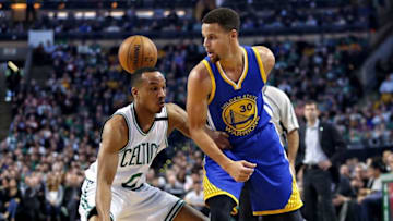 Dec 11, 2015; Boston, MA, USA; Golden State Warriors guard Stephen Curry (30) throws a behind the back pass past Boston Celtics guard Avery Bradley (0) during the first half at TD Garden. Mandatory Credit: Winslow Townson-USA TODAY Sports