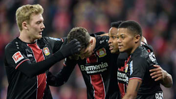 MAINZ, GERMANY - FEBRUARY 08: Nascimento Borges Wendell of Leverkusen celebrates with teammates Julian Brandt, Kai Havertz and Leon Bailey after scoring the opening goal lead during the Bundesliga match between 1. FSV Mainz 05 and Bayer 04 Leverkusen at the Opel Arena on February 08, 2019 in Mainz, Germany. (Photo by Jörg Schüler/Getty Images)