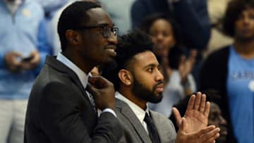 Dec 7, 2016; Chapel Hill, NC, USA; North Carolina Tar Heels guards Theo Pinson (left) and Joel Berry II watch their team during the first half against the Davidson Wildcats at Dean E. Smith Center. Mandatory Credit: Rob Kinnan-USA TODAY Sports