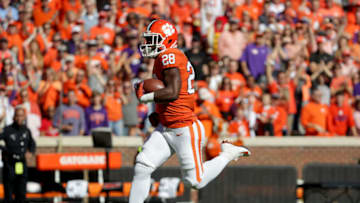 CLEMSON, SC - NOVEMBER 03: Tavien Feaster #28 of the Clemson Tigers runs for a touchdown against the Louisville Cardinals during their game at Clemson Memorial Stadium on November 3, 2018 in Clemson, South Carolina. (Photo by Streeter Lecka/Getty Images)