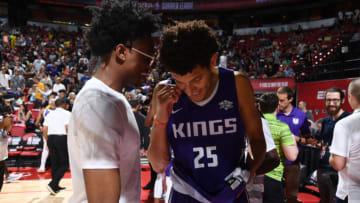 LAS VEGAS, NV - JULY 10: De'Aaron Fox and Justin Jackson #25 of the Sacramento Kings talk after the game against the Memphis Grizzlies during the 2018 Las Vegas Summer League on July 9, 2018 at the Thomas & Mack Center in Las Vegas, Nevada. NOTE TO USER: User expressly acknowledges and agrees that, by downloading and or using this Photograph, user is consenting to the terms and conditions of the Getty Images License Agreement. Mandatory Copyright Notice: Copyright 2018 NBAE (Photo by Garrett Ellwood/NBAE via Getty Images)