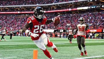 ATLANTA, GA - OCTOBER 14: Tevin Coleman #26 of the Atlanta Falcons makes a touchdown during the fourth quarter against the Tampa Bay Buccaneers at Mercedes-Benz Stadium on October 14, 2018 in Atlanta, Georgia. (Photo by Scott Cunningham/Getty Images)