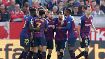 SEVILLA, SPAIN - FEBRUARY 23: (L-R) Samuel Umtiti of FC Barcelona, Philippe Coutinho of FC Barcelona, Lionel Messi of FC Barcelona, Nelson Semedo of FC Barcelona, Sergio Busquets of FC Barcelona celebrate goal during the La Liga Santander match between Sevilla v FC Barcelona at the Estadio Ramon Sanchez Pizjuan on February 23, 2019 in Sevilla Spain (Photo by Eric Verhoeven/Soccrates/Getty Images)