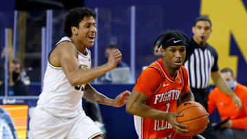 Mar 2, 2021; Ann Arbor, Michigan, USA; Illinois Fighting Illini guard Trent Frazier (1) dribbles on Michigan Wolverines guard Eli Brooks (55) in the second half at Crisler Center. Mandatory Credit: Rick Osentoski-USA TODAY Sports