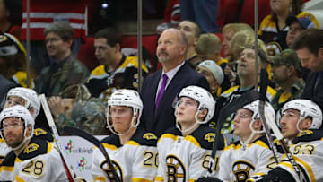 Dec 23, 2016; Raleigh, NC, USA; Boston Bruins head coach Claude Julien looks up after a Carolina Hurricanes goal during the third period at PNC Arena. The Carolina Hurricanes defeated the Boston Bruins 3-2 in overtime. Mandatory Credit: James Guillory-USA TODAY Sports