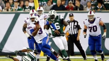 Sep 22, 2013; East Rutherford, NJ, USA; Buffalo Bills quarterback EJ Manuel (3) scrambles during the fourth quarter against the New York Jets at MetLife Stadium. Mandatory Credit: Anthony Gruppuso-USA TODAY Sports