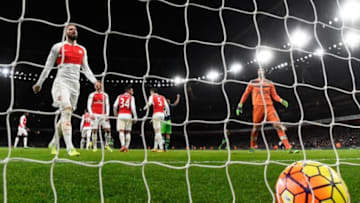 LONDON, ENGLAND - MARCH 02: Arsenal players stand dejected (Olivier Giroud (l) and Petr Cech (r) after Ashley Williams of Swansea City (not pictured) scores his sides second goal during the Barclays Premier League match between Arsenal and Swansea City at the Emirates Stadium on March 2, 2016 in London, England. (Photo by Mike Hewitt/Getty Images)