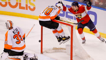 Nov 24, 2021; Sunrise, Florida, USA; Florida Panthers center Sam Bennett (9) reacts after an overtime goal by defenseman Aaron Ekblad (not pictured) to win the game against the Philadelphia Flyers at FLA Live Arena. Mandatory Credit: Sam Navarro-USA TODAY Sports