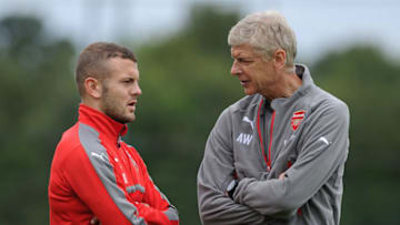ST ALBANS, ENGLAND - AUGUST 13: Arsenal manager Arsene Wenger talks to Jack Wilshere during a training session on August 13, 2016 in St Albans, England. (Photo by Stuart MacFarlane/Arsenal FC via Getty Images)