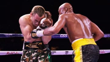 GUADALAJARA, MEXICO - JUNE 19: Anderson Silva (R) punches Julio Cesar Chavez Jr (L) during a fight between Julio Cesar Chavez Jr and Anderson Silva as part of the Tribute to the Kings at Jalisco Stadium on June 19, 2021 in Guadalajara, Mexico. (Photo by Alfredo Moya/Jam Media/Getty Images)
