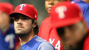 ARLINGTON, TX - SEPTEMBER 28: Cole Hamels #35 of the Texas Rangers stands in the dugout during a baseball game against the Oakland Athletics at Globe Life Park in Arlington on September 28, 2017 in Arlington, Texas. (Photo by Richard W. Rodriguez/Getty Images)