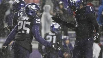 Nov 27, 2015; Fort Worth, TX, USA; TCU Horned Frogs wide receiver KaVontae Turpin (25) celebrates with wide receiver Emanuel Porter (1) after scoring a touchdown in the second overtime against the Baylor Bears at Amon G. Carter Stadium. TCU won 28-21 in double overtime. Mandatory Credit: Tim Heitman-USA TODAY Sports