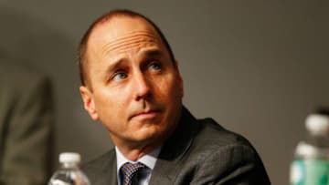 NEW YORK, NY - DECEMBER 20: General Manager Brian Cashman looks on during Carlos Beltran's introductory press conference at Yankee Stadium on December 20, 2013 in the Bronx borough of New York City. (Photo by Mike Stobe/Getty Images)