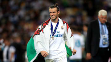 Real Madrid's Gareth Bale celebrates after winning the UEFA Champions League Final at the NSK Olimpiyskiy Stadium, Kiev. (Photo by Mike Egerton/PA Images via Getty Images)