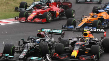 Valtteri Bottas, Mercedes, and Max Verstappen, Red Bull, Formula 1(Photo by PETER KOHALMI/POOL/AFP via Getty Images)