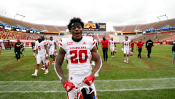 AMES, IA - SEPTEMBER 12: Running back Emani Bailey #20 of the Louisiana-Lafayette Ragin Cajuns celebrates with his teammates as he leave the field after the Louisiana-Lafayette Ragin Cajuns defeated the Iowa State Cyclones 31-14 at Jack Trice Stadium on September 12, 2020 in Ames, Iowa. The Louisiana-Lafayette Ragin Cajuns won 31-14 over the Iowa State Cyclones. (Photo by David K Purdy/Getty Images)