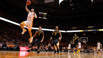 KNOXVILLE, TN - FEBRUARY 5: Lamonte Turner #1 of the Tennessee Volunteers dunks the ball in front of Xavier Pinson #1 of the Missouri Tigers and Torrence Watson #0 of the Missouri Tigers during their game at Thompson-Boling Arena on February 5, 2019 in Knoxville, Tennessee. (Photo by Donald Page/Getty Images)