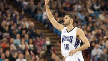 Apr 7, 2015; Sacramento, CA, USA; Sacramento Kings forward Omri Casspi (18) signals to the crowd after making a three point shot against the Minnesota Timberwolves during the first quarter at Sleep Train Arena. Mandatory Credit: Ed Szczepanski-USA TODAY Sports