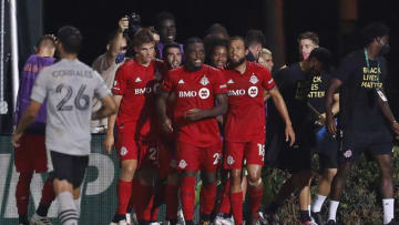 Ayo Akinola #20 of Toronto FC celebrates with teammates. (Photo by Michael Reaves/Getty Images)