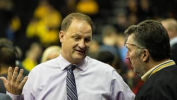 Jan 31, 2015; Iowa City, IA, USA; ESPN announcer Dan Dakich talks with Iowa Hawkeye fans before the game at Carver-Hawkeye Arena against the Wisconsin Badgers two weeks after controversial comments were made about Iowa Hawkeyes center Adam Woodbury (34). Mandatory Credit: Jeffrey Becker-USA TODAY Sports