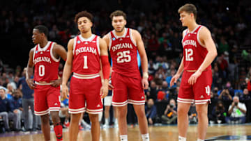 PORTLAND, OREGON - MARCH 17: Xavier Johnson #0, Rob Phinisee #1, Race Thompson #25, and Miller Kopp #12 of the Indiana Hoosiers stand on the court against St. Mary's Gaels in the first round game of the 2022 NCAA Men's Basketball Tournament at Moda Center on March 17, 2022 in Portland, Oregon. (Photo by Abbie Parr/Getty Images)