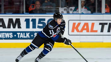 KELOWNA, BC - DECEMBER 30: Matthew Phillips #11 of the Victoria Royals skates with the puck against the Kelowna Rockets at Prospera Place on December 30, 2017 in Kelowna, Canada. Phillips is a 2016 NHL entry draft pick of the Calgary Flames. (Photo by Marissa Baecker/Getty Images)