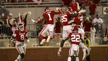 Nov 7, 2020; Norman, Oklahoma, USA; Oklahoma Sooners cornerback Joshua Eaton (1) and defensive lineman Isaiah Thomas (95) and defensive end Ronnie Perkins (7) and defensive back Jeremiah Criddell (22) and defensive lineman Perrion Winfrey (8) celebrate during the second half against the Kansas Jayhawks at Gaylord Family-Oklahoma Memorial Stadium. Mandatory Credit: Kevin Jairaj-USA TODAY Sports