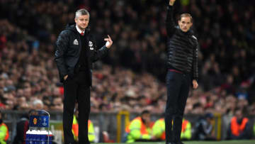 MANCHESTER, ENGLAND - FEBRUARY 12: Ole Gunnar Solskjaer, Manager of Manchester United and Thomas Tuchel, Manager of PSG stand on the touchline during the UEFA Champions League Round of 16 First Leg match between Manchester United and Paris Saint-Germain at Old Trafford on February 12, 2019 in Manchester, England. (Photo by Michael Regan/Getty Images)