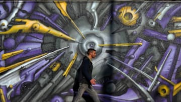 ATHENS, GREECE, NOVEMBER 10: Walls are adorned with works of contemporary graffiti on the streets of Athens on November 10, 2014 in Athens, Greece. The hardships and unemployment of the country's economic collapse have led to a new wave of innovative graffiti, which is both politically aware and socially accepted making the city a Mecca for street artists. (Photo by Milos Bicanski/Getty Images)