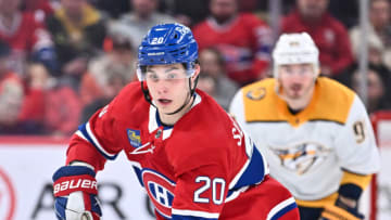 MONTREAL, CANADA - JANUARY 12: Juraj Slafkovsky #20 of the Montreal Canadiens skates the puck during the second period against the Nashville Predators at Centre Bell on January 12, 2023 in Montreal, Quebec, Canada. The Montreal Canadiens defeated the Nashville Predators 4-3. (Photo by Minas Panagiotakis/Getty Images)