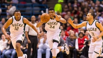 Apr 3, 2016; Milwaukee, WI, USA; Milwaukee Bucks forward Giannis Antetokounmpo (34), forward Jabari Parker (12) and guard Tyler Ennis (11) during the game against the Chicago Bulls at BMO Harris Bradley Center. Chicago won 102-98. Mandatory Credit: Jeff Hanisch-USA TODAY Sports