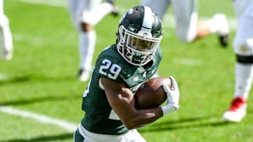 Michigan State's Shakur Brown returns an interception during the second quarter on Saturday, Oct. 24, 2020, at Spartan Stadium in East Lansing.201024 Msu Rutgers 138a