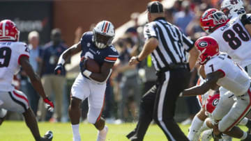 Auburn football running back Shaun Shivers (8) finds running room against Georgia at Jordan-Hare Stadium in Auburn, Ala., on Saturday, Oct. 9, 2021.Auga02