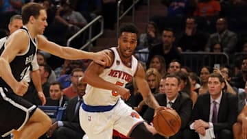 Oct 8, 2016; New York, NY, USA; New York Knicks guard Courtney Lee (5) drives to the basket past Brooklyn Nets guard Bojan Bogdanovic (44) during the first half at Madison Square Garden. Mandatory Credit: Adam Hunger-USA TODAY Sports