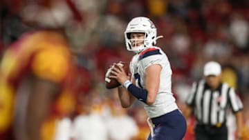 LOS ANGELES, CALIFORNIA - OCTOBER 19: Quarterback Grant Gunnell #17 of the Arizona Wildcats looks to pass against the USC Trojans at Los Angeles Memorial Coliseum on October 19, 2019 in Los Angeles, California. (Photo by Meg Oliphant/Getty Images)