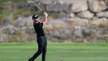 LAS VEGAS, NEVADA - OCTOBER 08: Patrick Cantlay hits an approach shot on the 18th hole fairway during round one of the Shriners Hospitals For Children Open at TPC Summerlin on October 08, 2020 in Las Vegas, Nevada. (Photo by Matthew Stockman/Getty Images)