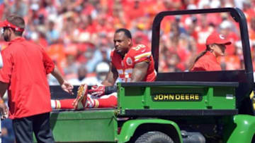 Sep 7, 2014; Kansas City, MO, USA; Kansas City Chiefs inside linebacker Derrick Johnson (56) is taken off the field after an injury during the first half against the Tennessee Titans at Arrowhead Stadium. Mandatory Credit: Denny Medley-USA TODAY Sports