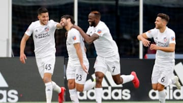 FOXBOROUGH, MA - MARCH 24: FC Cincinnati midfielder Kenny Saief (93) celebrates his goal with FC Cincinnati midfielder Emmanuel Ledesma (45) and FC Cincinnati midfielder Roland Lamah (7) during a match between the New England Revolution and FC Cincinnati on March 24, 2019, at Gillette Stadium in Foxborough, Massachusetts. (Photo by Fred Kfoury III/Icon Sportswire via Getty Images)