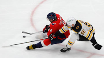 May 15, 2021; Washington, District of Columbia, USA; Washington Capitals left wing Alex Ovechkin (8) skates in on goal as Boston Bruins defenseman Jeremy Lauzon (55) defends in the third period in game one of the first round of the 2021 Stanley Cup Playoffs at Capital One Arena. Mandatory Credit: Geoff Burke-USA TODAY Sports
