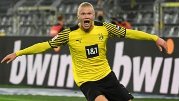 Dortmund's Norwegian forward Erling Braut Haaland celebrates scoring the 3-2 goal during the German first division Bundesliga football match between Borussia Dortmund and TSG 1899 Hoffenheim in Dortmund, western Germany, on August 27, 2021. - DFL REGULATIONS PROHIBIT ANY USE OF PHOTOGRAPHS AS IMAGE SEQUENCES AND/OR QUASI-VIDEO (Photo by Ina Fassbender / AFP) / DFL REGULATIONS PROHIBIT ANY USE OF PHOTOGRAPHS AS IMAGE SEQUENCES AND/OR QUASI-VIDEO (Photo by INA FASSBENDER/AFP via Getty Images)