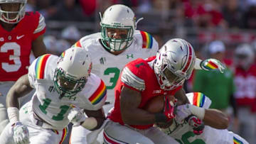 Sep 12, 2015; Columbus, OH, USA; Ohio State Buckeyes wide receiver Braxton Miller (1) is tackled by Hawaii Warriors linebacker Benetton Fonua (36) and linebacker Jahlani Tavai (31) and defensive back Nick Nelson (11) in the second half of the game at Ohio Stadium. Ohio State beat Hawaii 38-0. Mandatory Credit: Trevor Ruszkowski-USA TODAY Sports