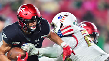 Cincinnati Bearcats Ethan Wright runs against the South Florida Bulls. Getty Images.