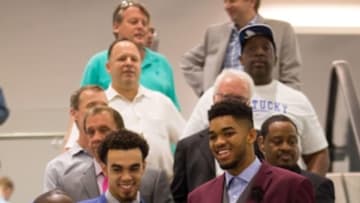 Jun 26, 2015; Minneapolis, MN, USA; Minnesota Timberwolves draft pick Tyus Jones (left) and first round draft pick Karl-Anthony Towns (right) get ready to meet the media at Mayo Clinic Square. Mandatory Credit: Brad Rempel-USA TODAY Sports